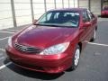 2005 Salsa Red Pearl Toyota Camry LE  photo #8