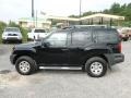 2010 Super Black Nissan Xterra X 4x4  photo #4