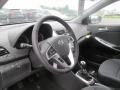 Black 2013 Hyundai Accent SE 5 Door Steering Wheel