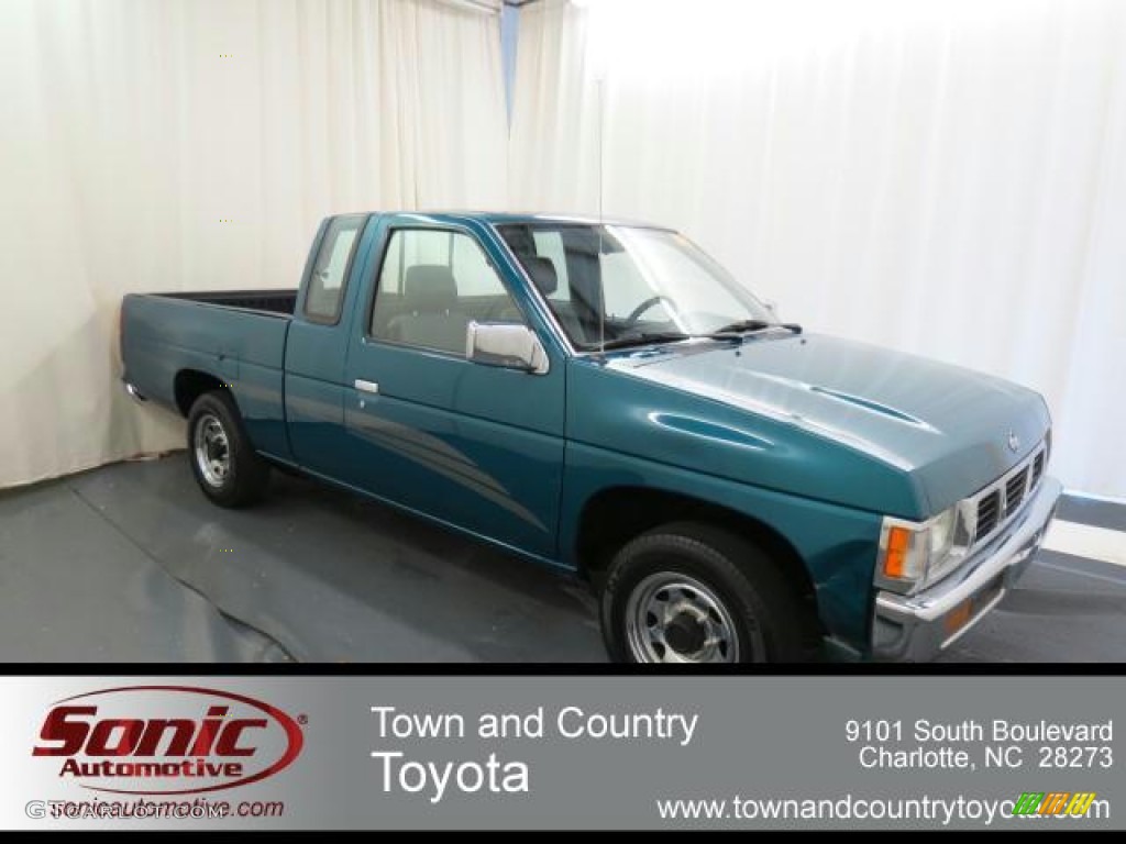 1995 Hardbody Truck XE Extended Cab - Vivid Teal Pearl Metallic / Gray photo #1