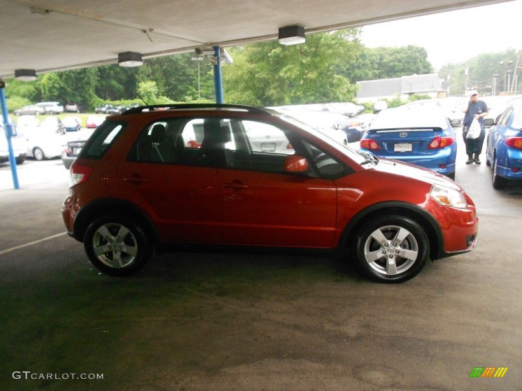 2011 SX4 Crossover Touring AWD - Cherry Red Metallic / Black photo #30