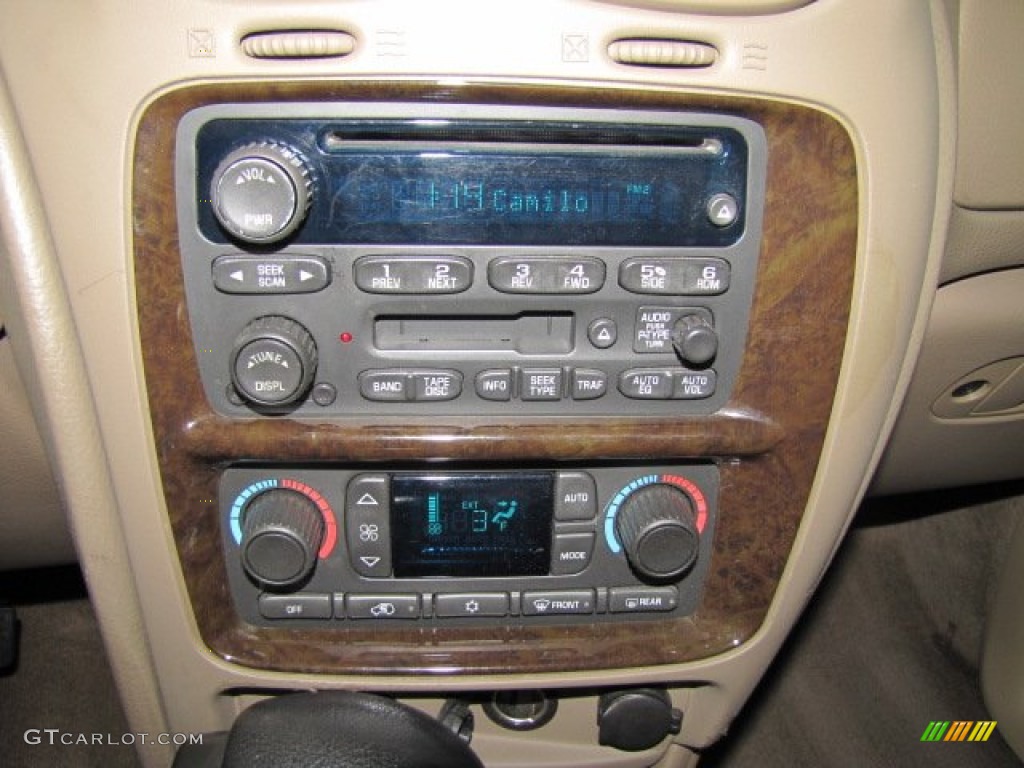 2004 Rainier CXL AWD - Black / Light Cashmere photo #16