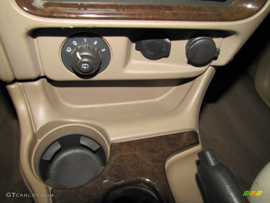 2004 Rainier CXL AWD - Black / Light Cashmere photo #17