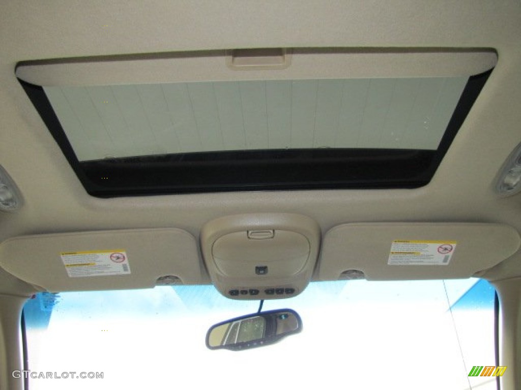 2004 Rainier CXL AWD - Black / Light Cashmere photo #30