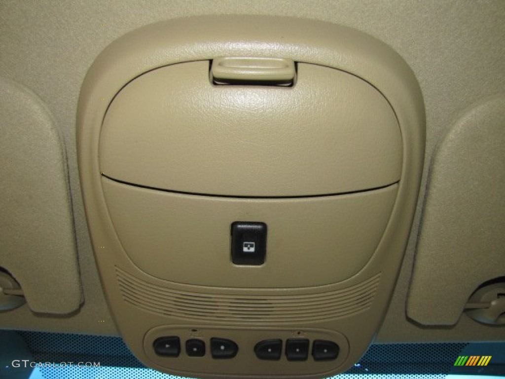 2004 Rainier CXL AWD - Black / Light Cashmere photo #33