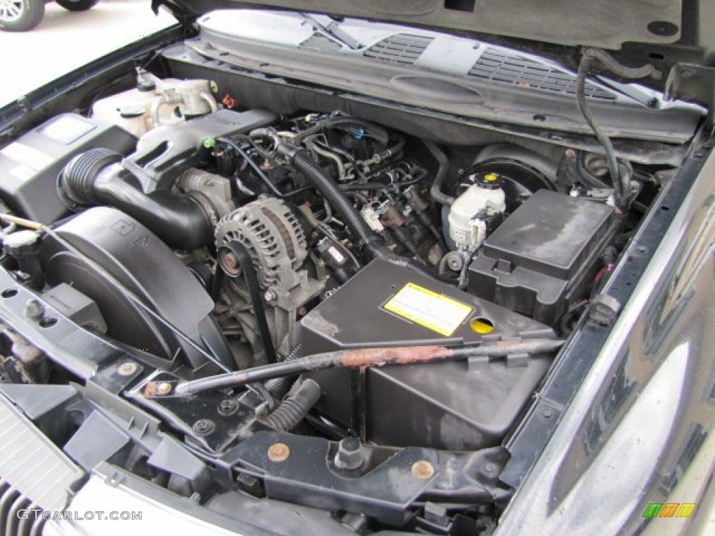 2004 Rainier CXL AWD - Black / Light Cashmere photo #41