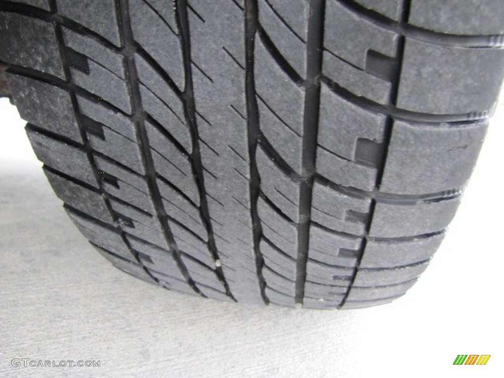 2004 Rainier CXL AWD - Black / Light Cashmere photo #46