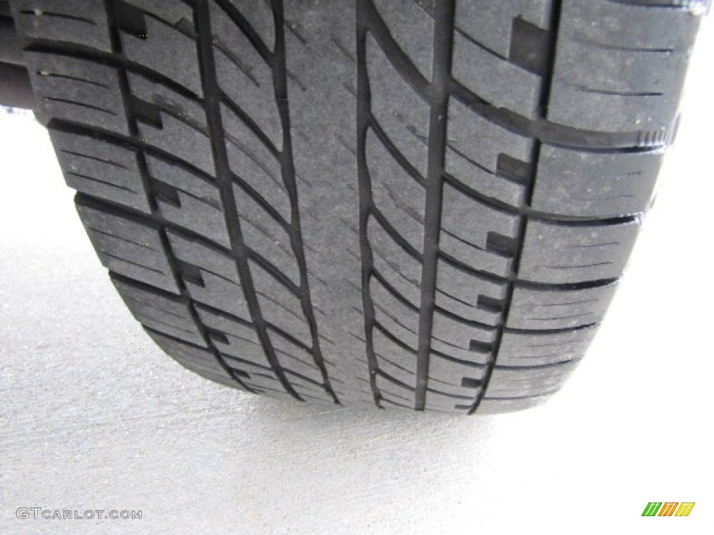2004 Rainier CXL AWD - Black / Light Cashmere photo #47