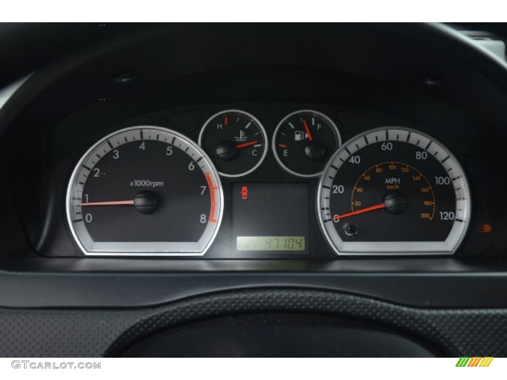 2010 Chevrolet Aveo LT Sedan Gauges Photo #68518231