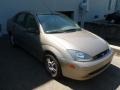 2003 Arizona Beige Metallic Ford Focus SE Sedan  photo #1