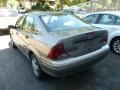 2003 Arizona Beige Metallic Ford Focus SE Sedan  photo #3