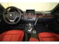 2012 BMW 3 Series Coral Red/Black Interior Dashboard Photo