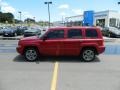2009 Inferno Red Crystal Pearl Jeep Patriot Sport  photo #2
