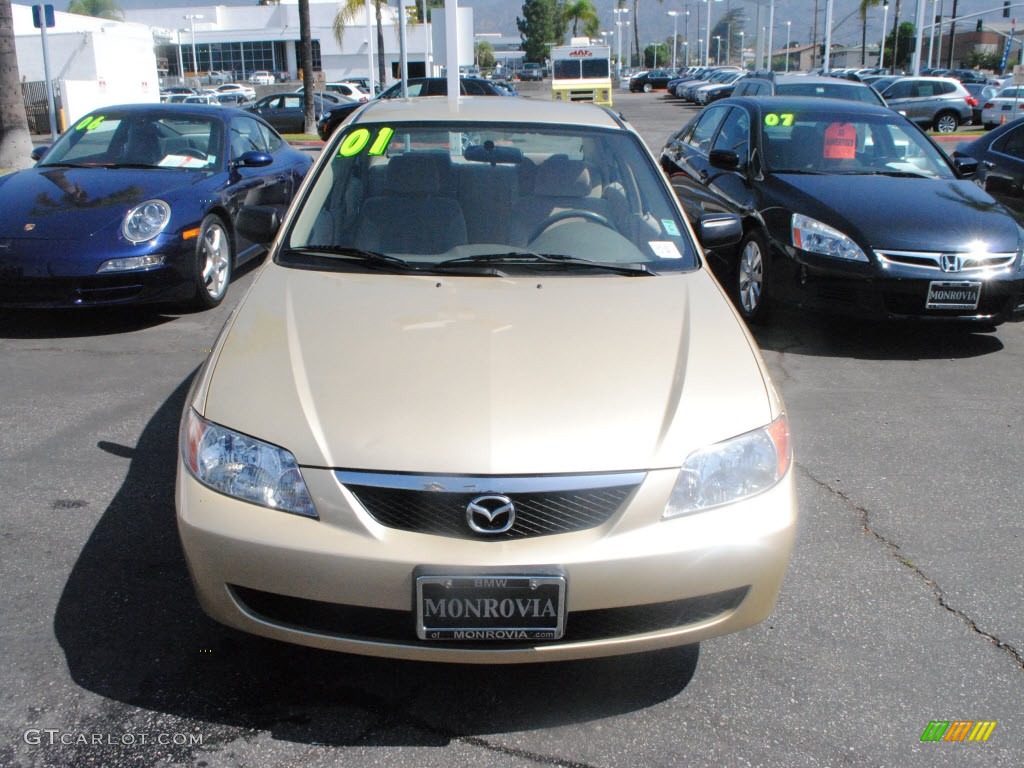 2001 Protege LX - Light Sandalwood Metallic / Beige photo #2
