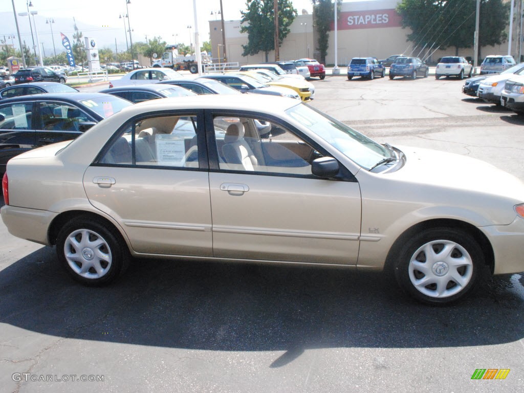 2001 Protege LX - Light Sandalwood Metallic / Beige photo #10
