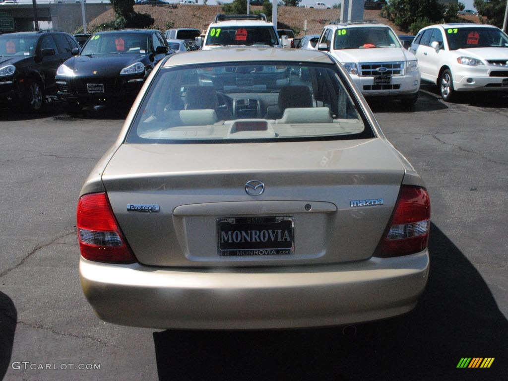 2001 Protege LX - Light Sandalwood Metallic / Beige photo #11