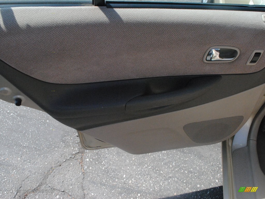 2001 Protege LX - Light Sandalwood Metallic / Beige photo #14