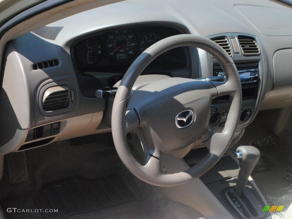 2001 Protege LX - Light Sandalwood Metallic / Beige photo #16