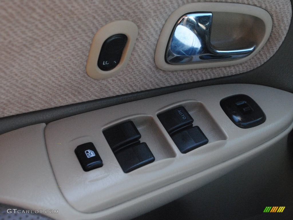 2001 Protege LX - Light Sandalwood Metallic / Beige photo #25