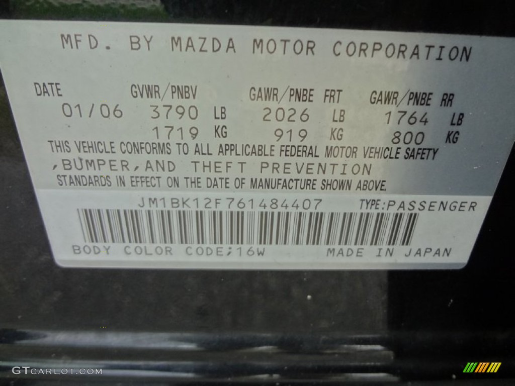 2006 MAZDA3 i Sedan - Black Mica / Black photo #25