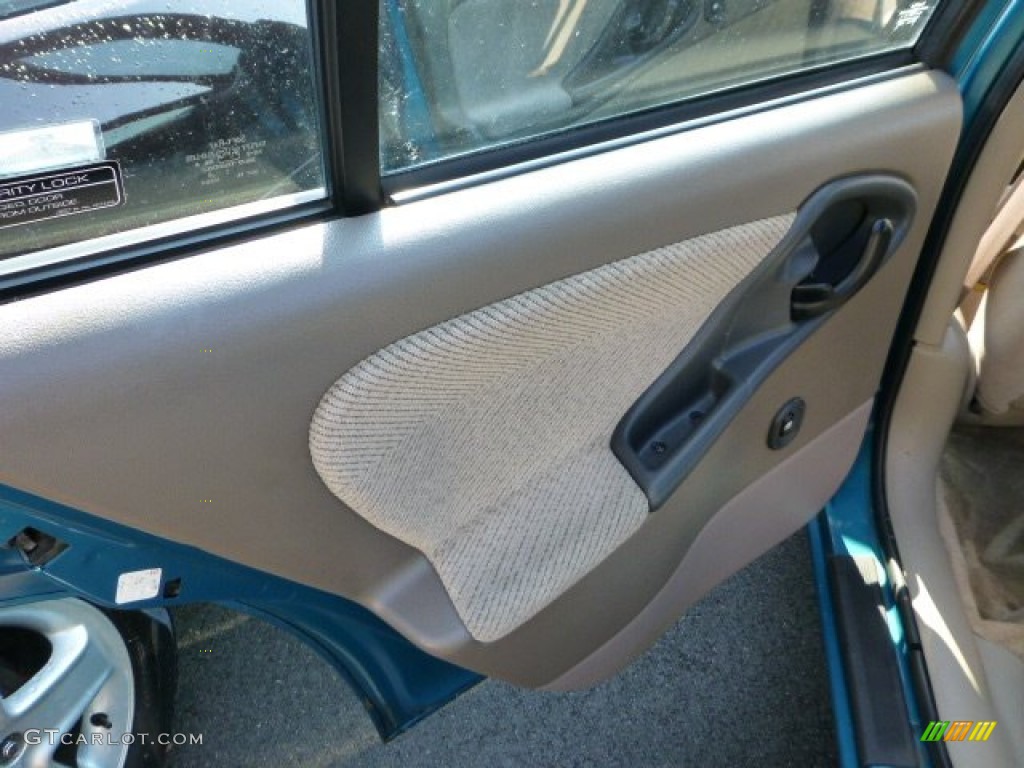 1997 Chevrolet Cavalier LS Sedan Neutral Door Panel Photo #68578084