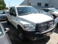 2008 Bright White Dodge Ram 1500 ST Quad Cab  photo #1