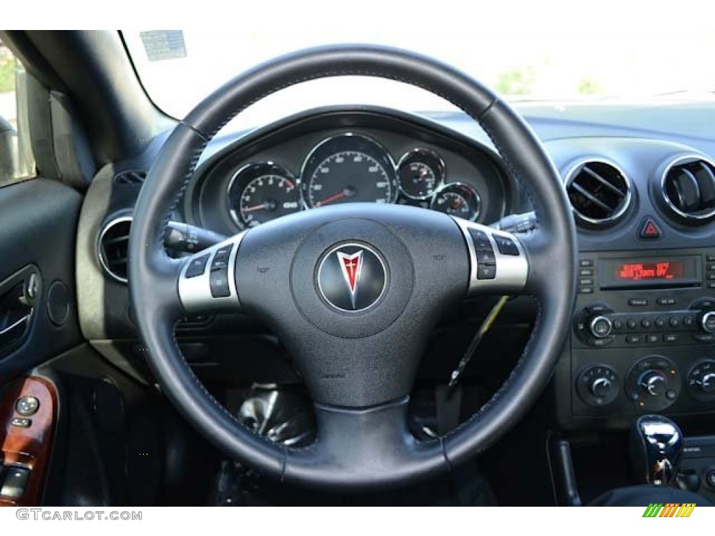 2007 Pontiac G6 GT Convertible Ebony Steering Wheel Photo #68587382