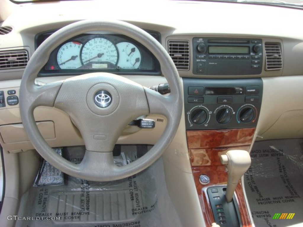 2004 Toyota Corolla LE Pebble Beige Dashboard Photo #68596545
