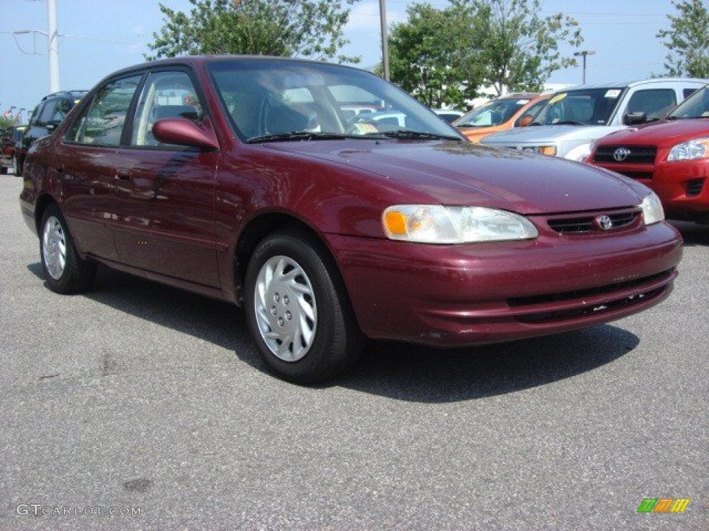 1998 Corolla LE - Ruby Red Pearl Metallic / Beige photo #1