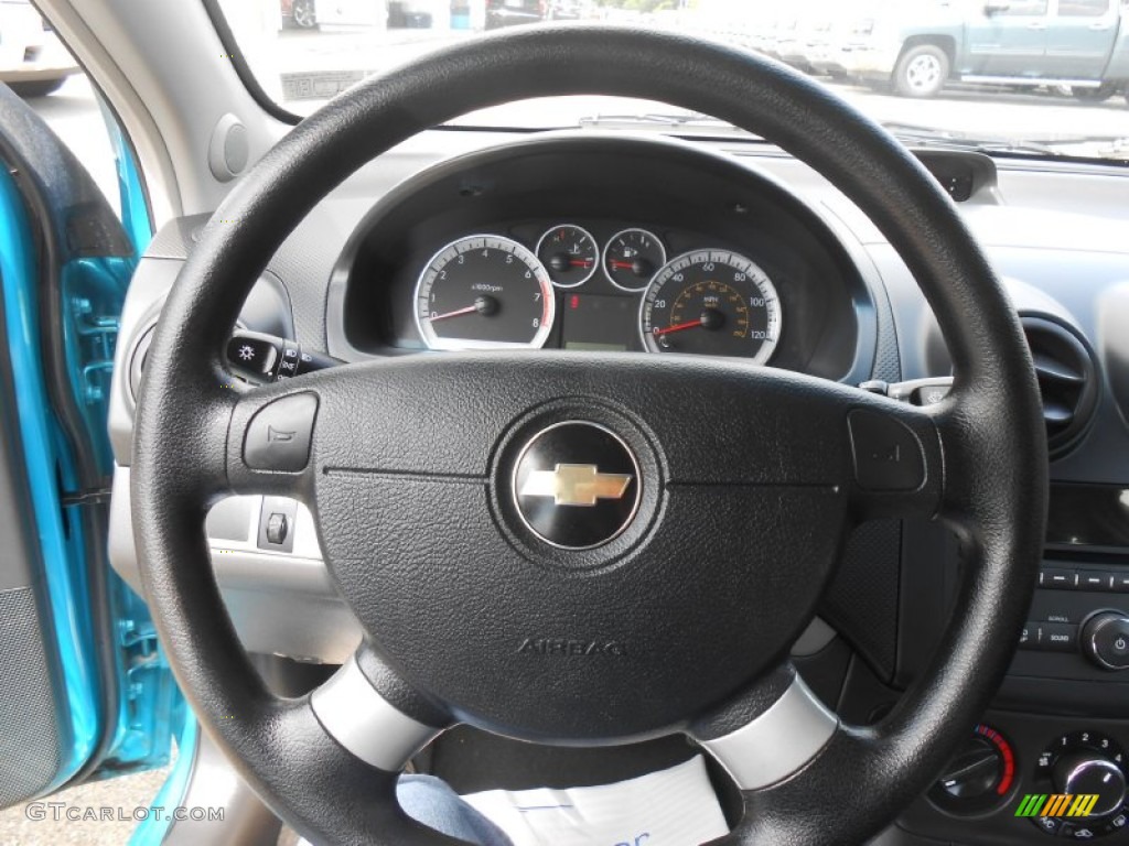 2009 Chevrolet Aveo LT Sedan Charcoal Steering Wheel Photo #68602193