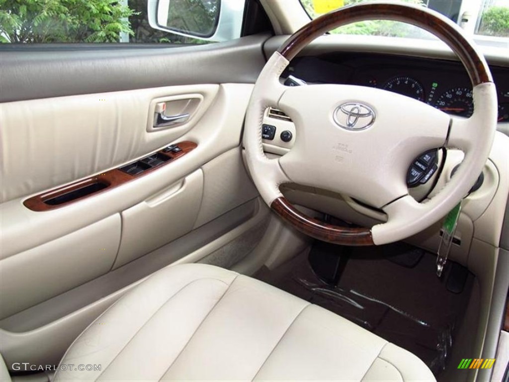 2003 Toyota Avalon XLS Ivory Steering Wheel Photo #68609222