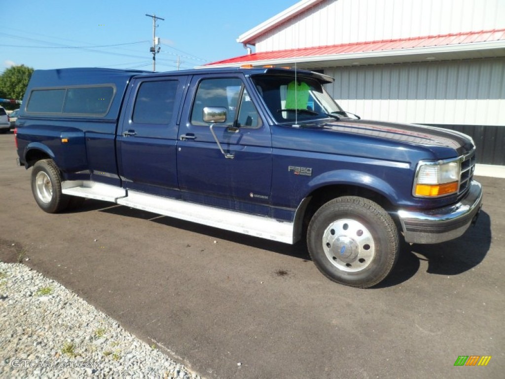 Dark Lapis Blue Metallic 1995 Ford F350 XLT Crew Cab Dually Exterior Photo #68641389