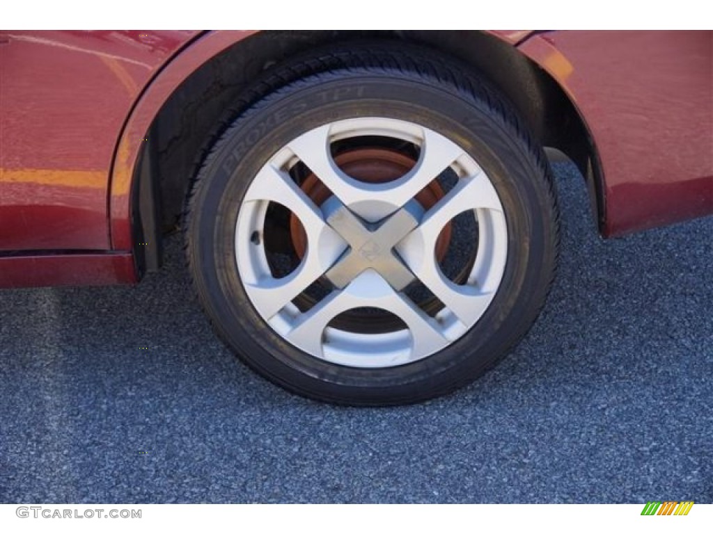 2003 Saturn ION 3 Sedan Wheel Photo #68644747