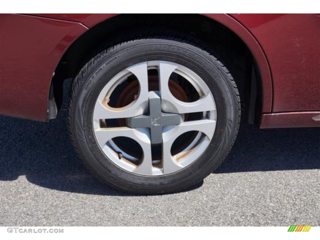 2003 Saturn ION 3 Sedan Wheel Photo #68644756