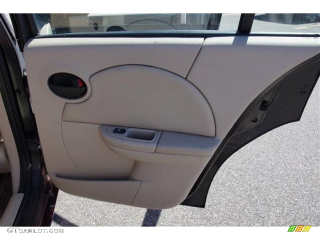 2003 Saturn ION 3 Sedan Tan Door Panel Photo #68644783
