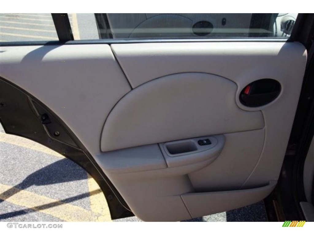 2003 Saturn ION 3 Sedan Tan Door Panel Photo #68644795