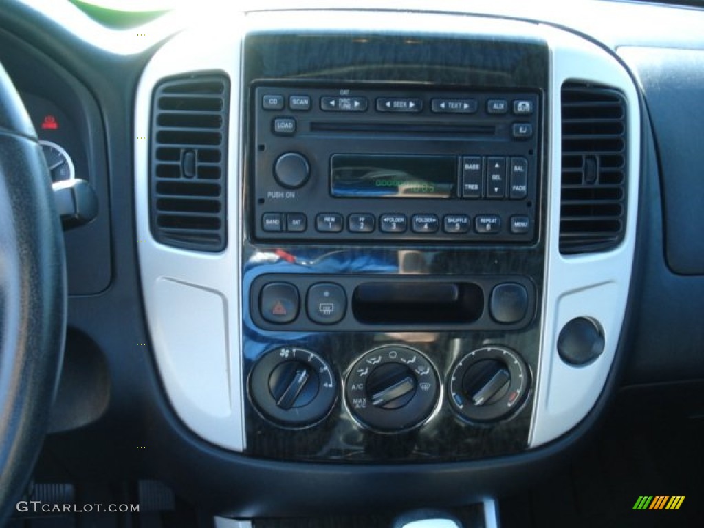 2007 Mariner Luxury 4WD - Light Tundra Metallic / Black photo #20