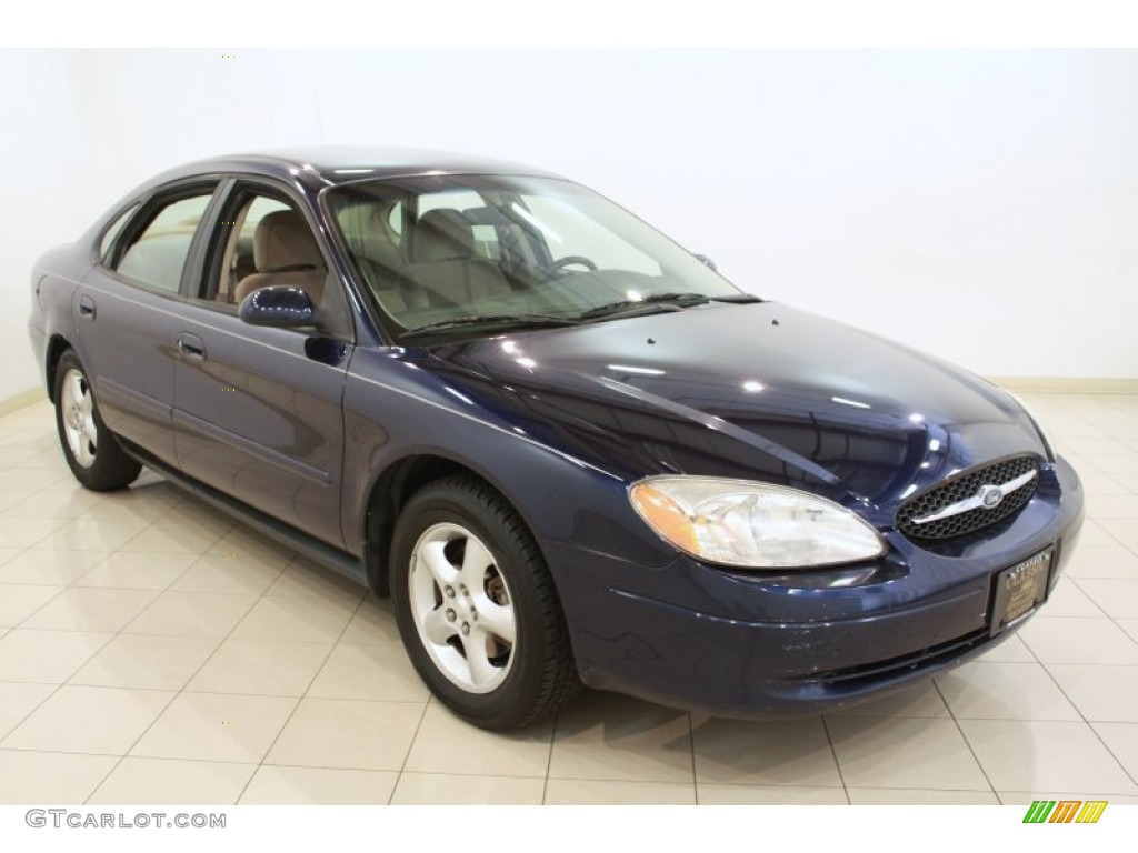 Medium Royal Blue Metallic Ford Taurus