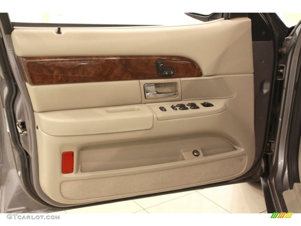 2006 Mercury Grand Marquis GS Medium Light Stone Door Panel Photo #68704537