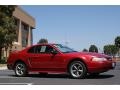 Laser Red Metallic 2000 Ford Mustang V6 Coupe Exterior