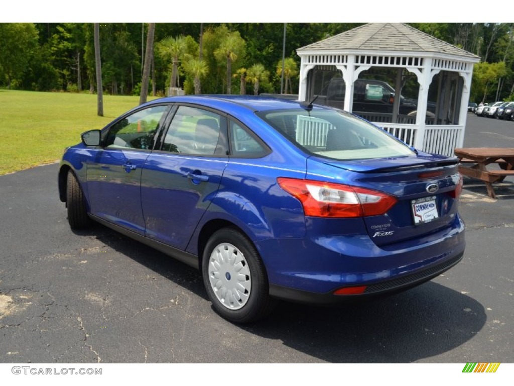 2012 Focus SE SFE Sedan - Blue Candy Metallic / Stone photo #7