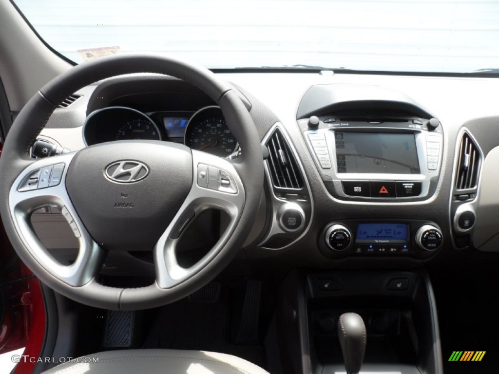 2013 Tucson Limited - Garnet Red / Taupe photo #25