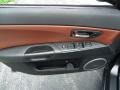 2005 Mazda MAZDA3 Saddle Brown Interior Door Panel Photo