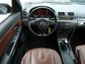 2005 Mazda MAZDA3 Saddle Brown Interior Dashboard Photo
