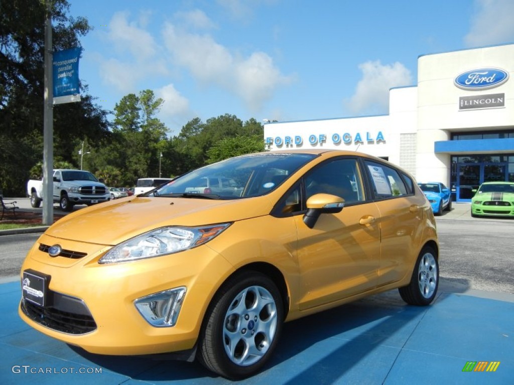 2011 Fiesta SES Hatchback - Yellow Blaze Metallic Tri-Coat / Charcoal Black/Blue Cloth photo #1