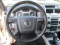 Black 2010 Mercury Mariner V6 Premier 4WD Steering Wheel