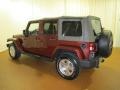 2009 Red Rock Crystal Pearl Jeep Wrangler Unlimited Sahara 4x4  photo #5