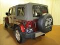 2009 Red Rock Crystal Pearl Jeep Wrangler Unlimited Sahara 4x4  photo #6