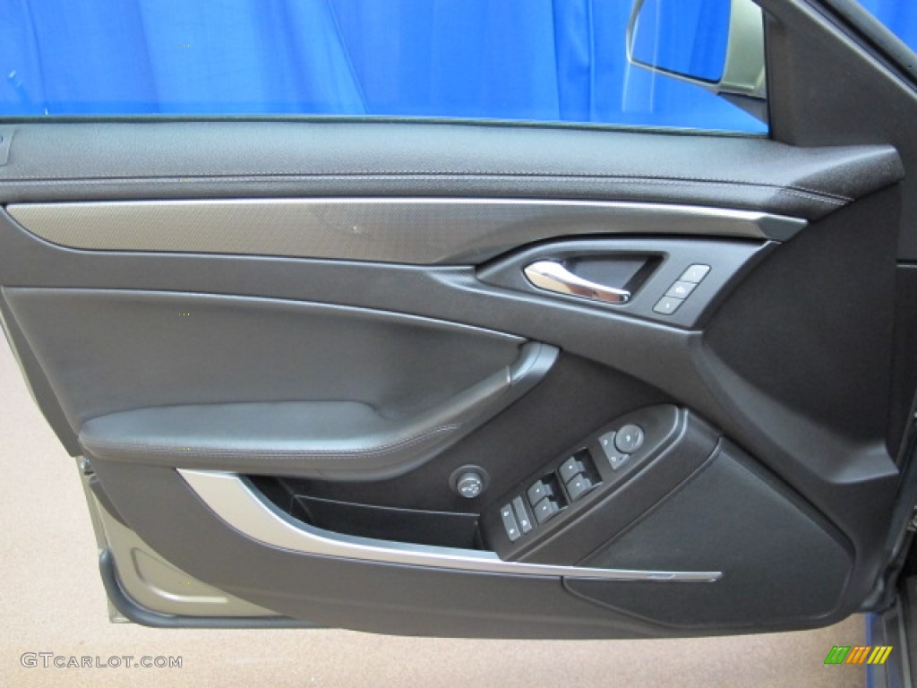 2010 Cadillac CTS 3.6 Sport Wagon Ebony Door Panel Photo #68869683