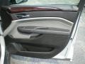 Ebony/Titanium Door Panel Photo for 2010 Cadillac SRX #68933952